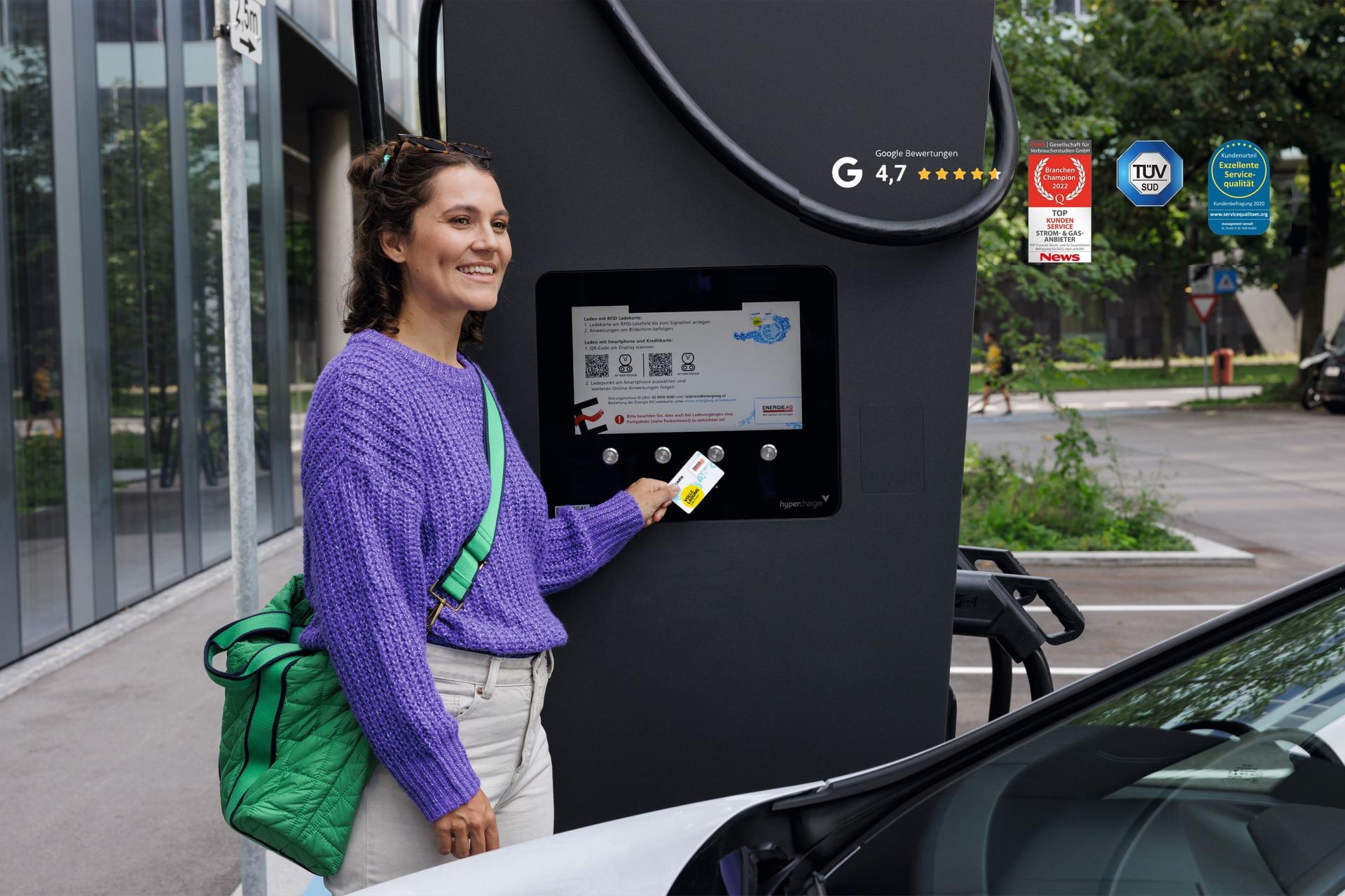 E-Mobilität, Wallbox, Frau, Auto, E-Auto laden